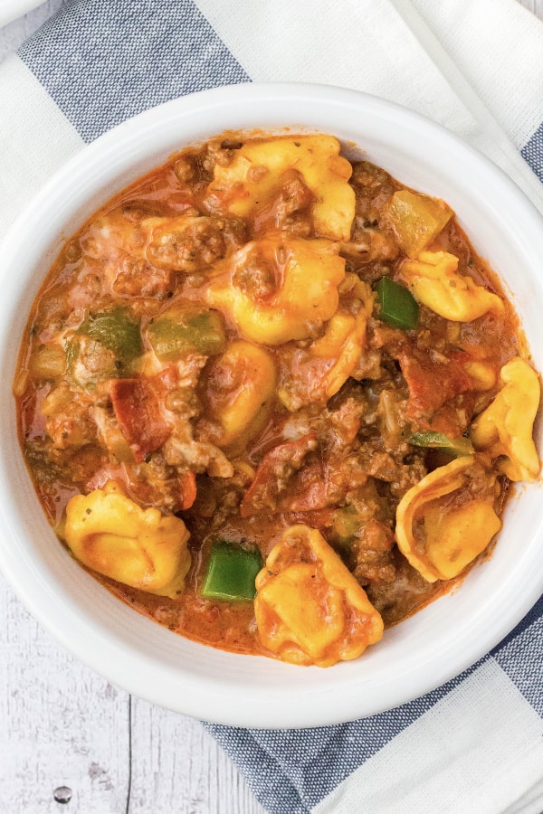 Pepperoni tortellini in a white bowl