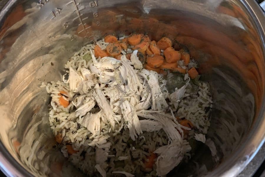 shredded chicken with wild rice and vegetables in an Instant Pot