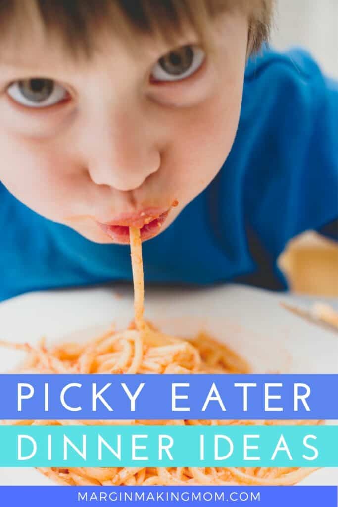 a boy eating a bowl of spaghetti