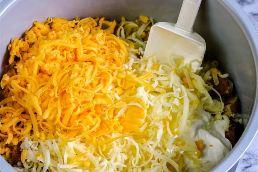 shredded cheese, sour cream, and macaroni in the Instant Pot