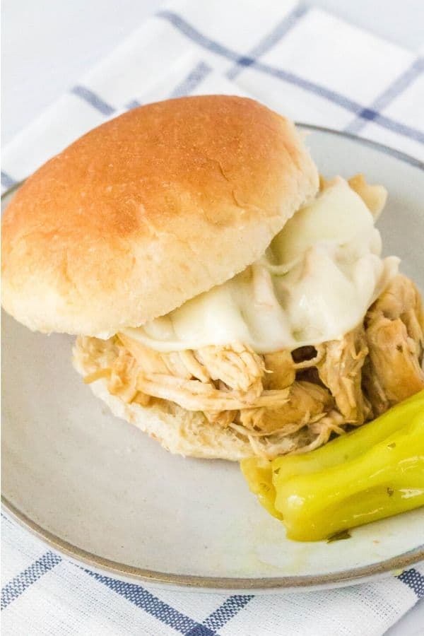 Mississippi chicken on a bun with provolone cheese