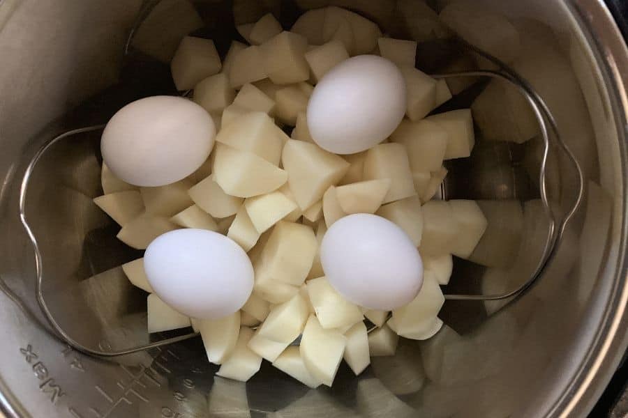 potatoes and eggs on the trivet in the Instant Pot