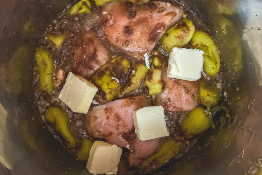 ingredients for Mississippi chicken combined in the insert pot of the Instant Pot