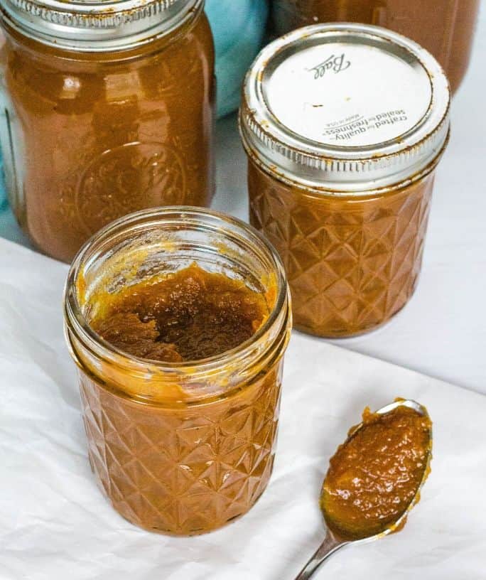 three jars of pumpkin apple butter that was cooked in the Instant Pot