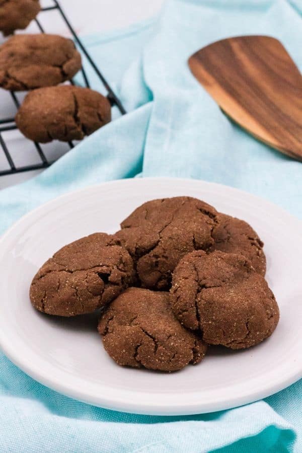 plate with several chocolate snickerdoodle cookies on it