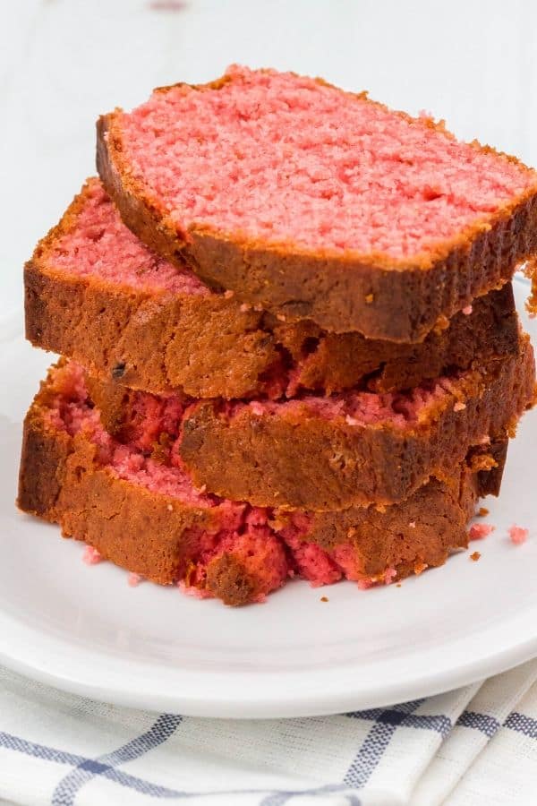 a stack of slices of strawberry banana bread