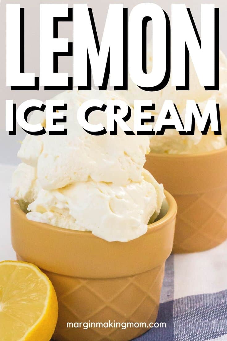 two dessert cups filled with homemade lemon ice cream, with a halved lemon next to one cup