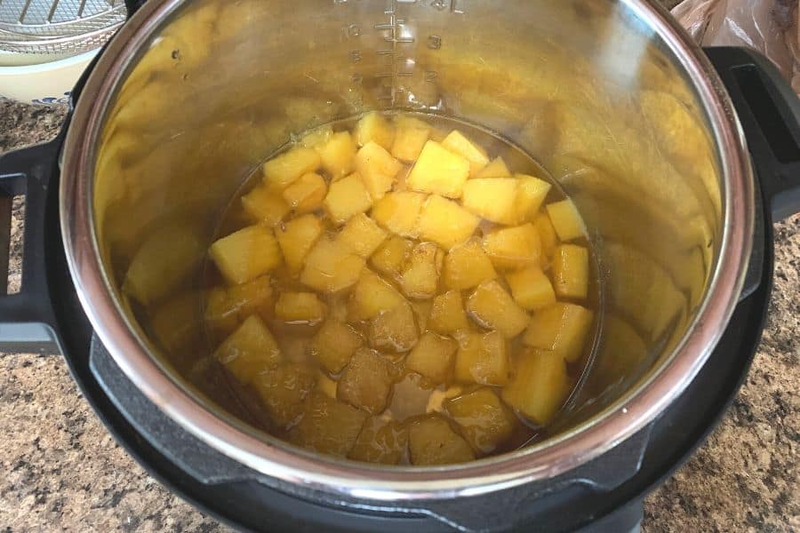 cooked pineapple during the jam making process