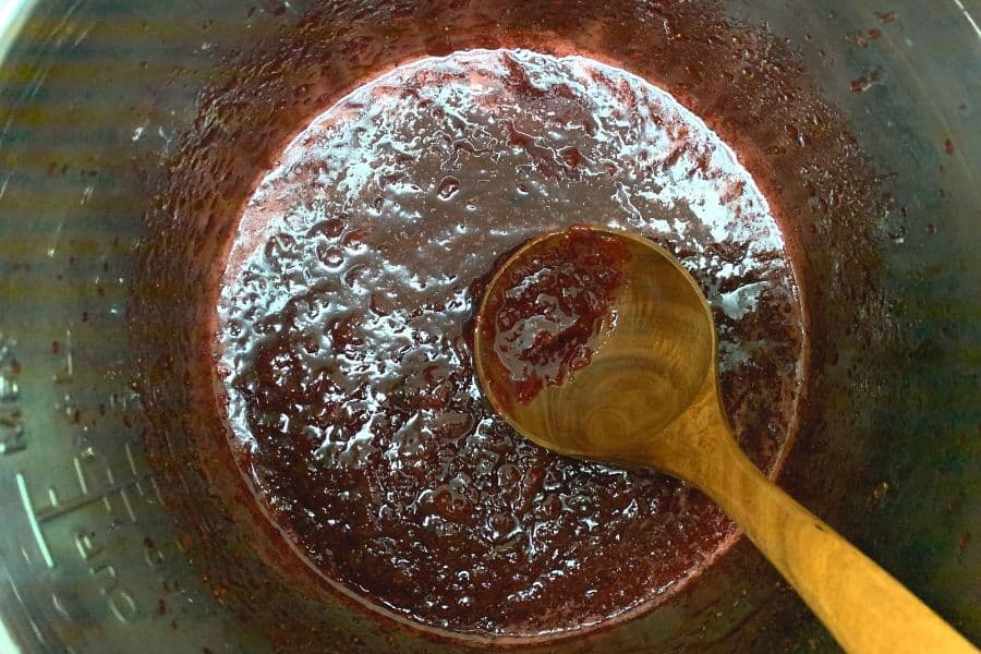 strawberry jam in the Instant Pot, simmered to a gel-like consistency