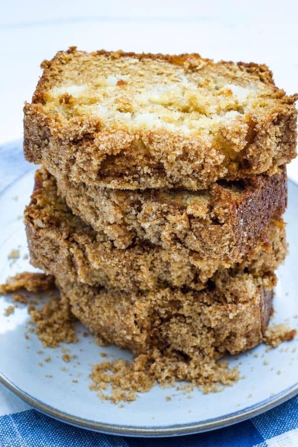 stack of pear bread slices on an ivory plate