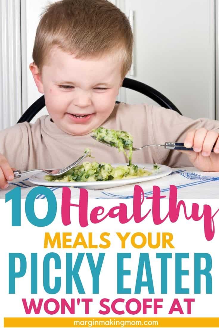 A boy grimacing at a plate of broccoli