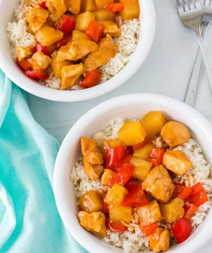 two bowls of Instant Pot Hawaiian chicken and rice ready to be served