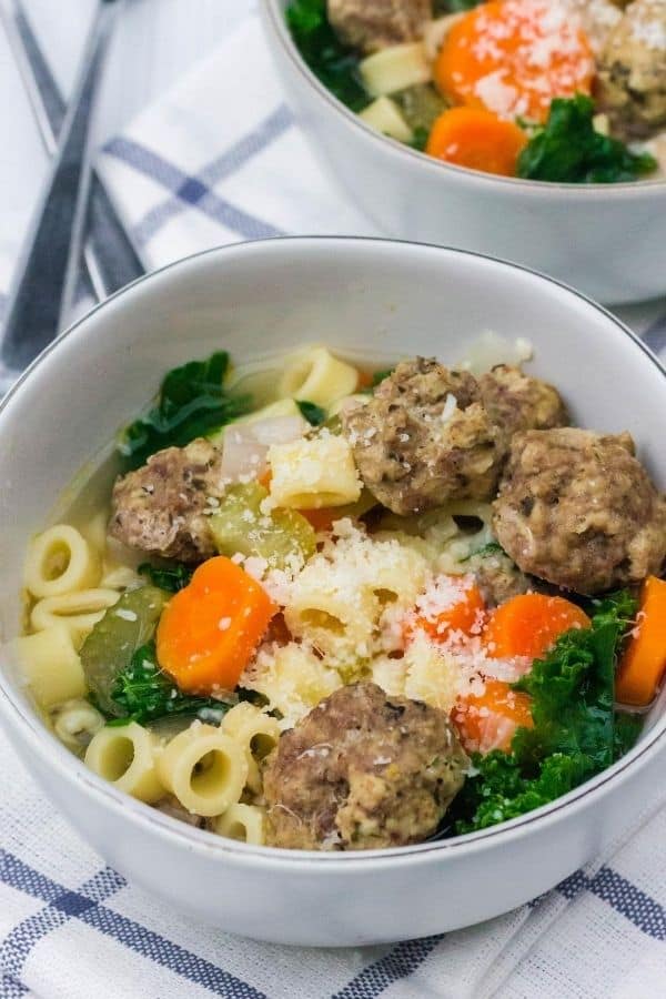 white bowl filled with homemade Italian wedding soup cooked in the Instant Pot pressure cooker