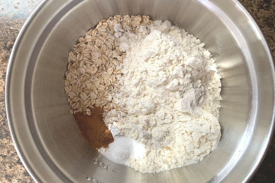 flour, oats, salt, baking powder, and cinnamon in a mixing bowl