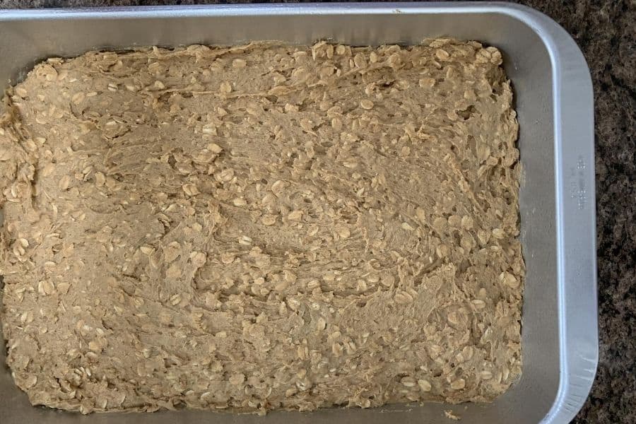 oatmeal cream pie cookie batter in a baking pan