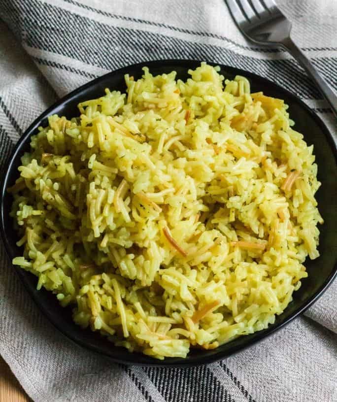 black plate with a serving of Instant Pot rice-a-roni on it