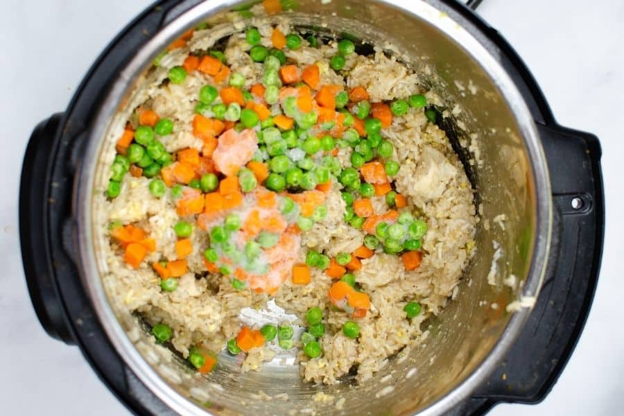 frozen peas and carrots added to chicken and rice