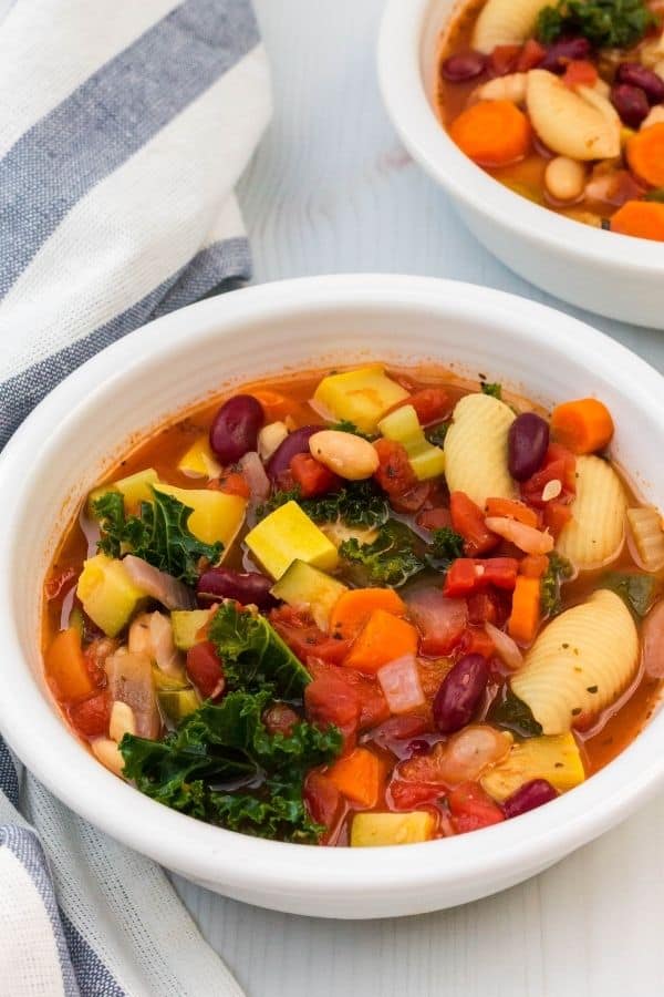 Two bowls filled with Olive Garden copycat Instant Pot minestrone soup.