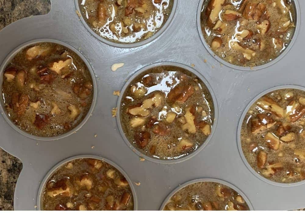 pecan pie topping added to cheesecake bites prior to pressure cooking