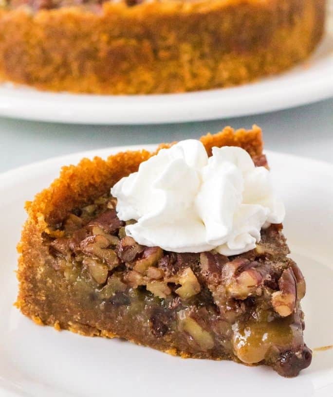 a slice of pecan pie cooked in the Instant Pot pressure cooker, on a white plate