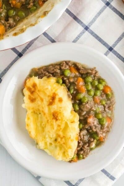 overhead view of a white plate with a serving of Instant Pot shepherd's pie on it