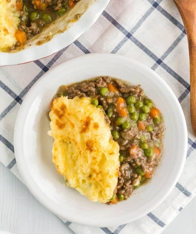 overhead view of a white plate with a serving of Instant Pot shepherd's pie on it