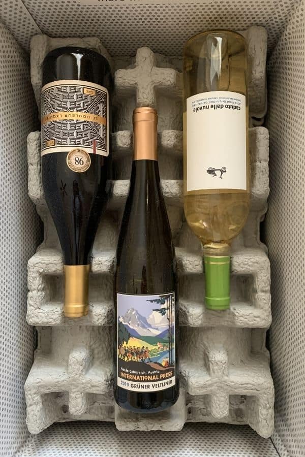 three bottles of wine in a firstleaf wine box