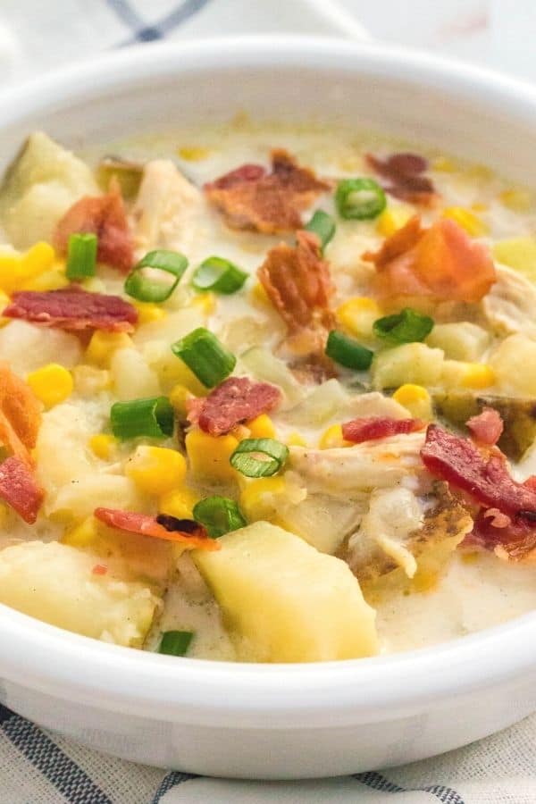 close-up view of Instant Pot corn and chicken chowder in a white bowl