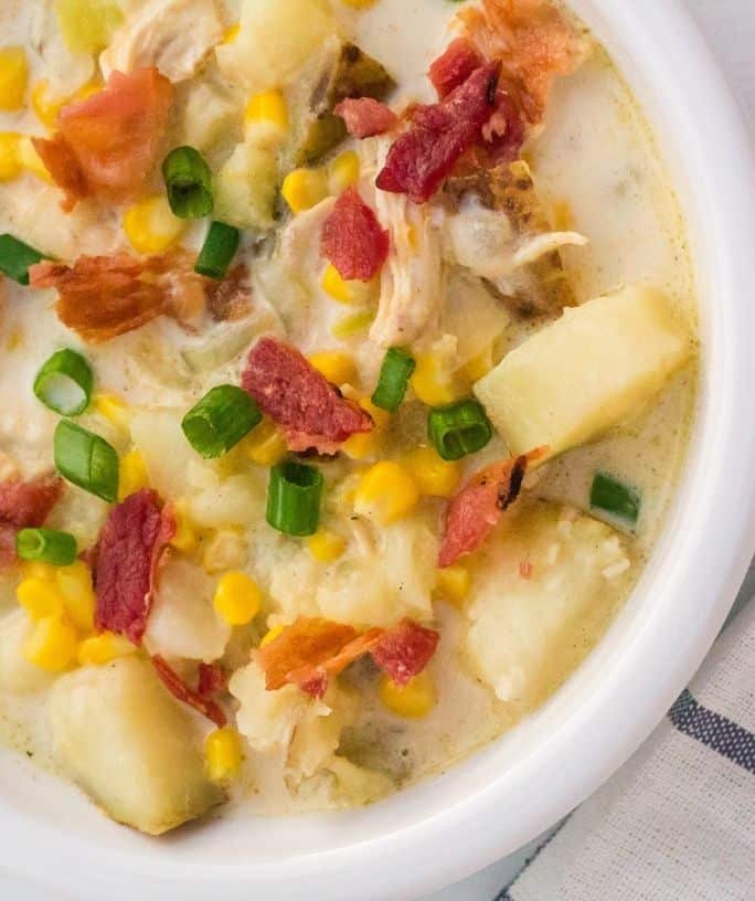 white bowl filled with Instant Pot chicken and corn chowder