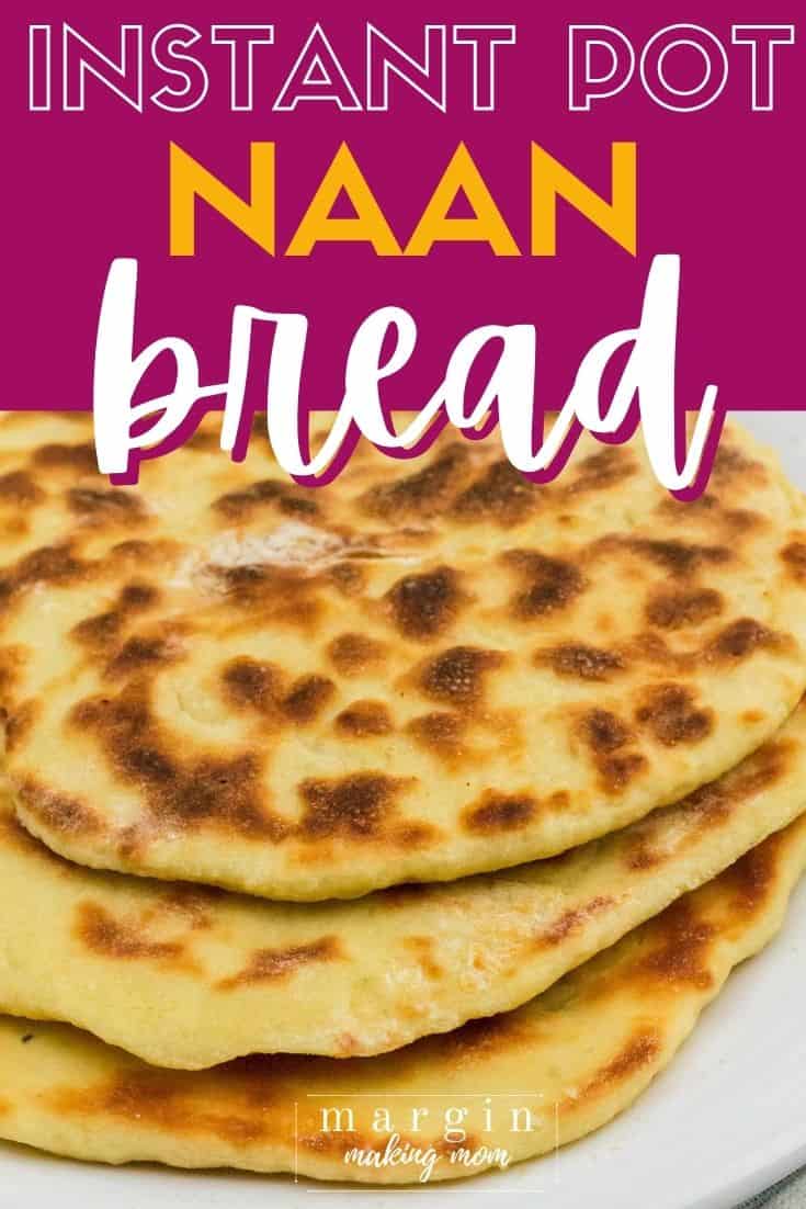 a stack of three pieces of homemade Instant Pot naan bread on a white plate