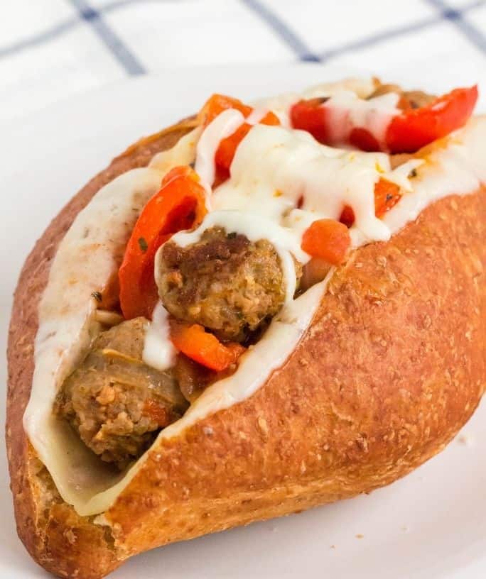 sub roll filled with Instant Pot sausage and peppers