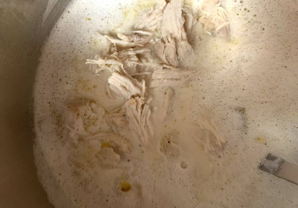 shredded chicken added to Instant Pot corn chowder
