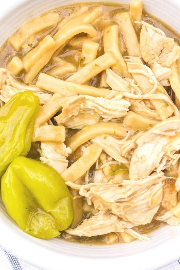 close-up view of a bowl serving pressure cooker Mississippi chicken and noodles