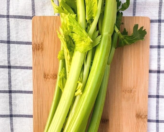 stalk of celery on a cutting board