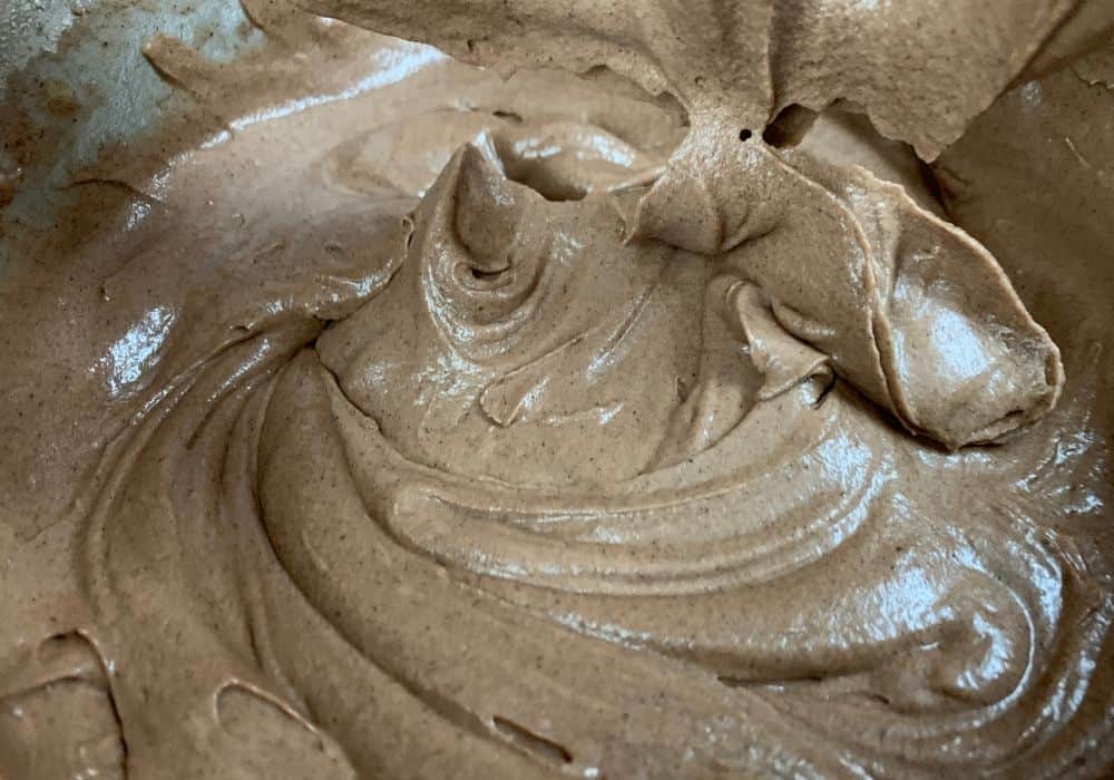 chocolate sour cream pound cake batter in a mixing bowl