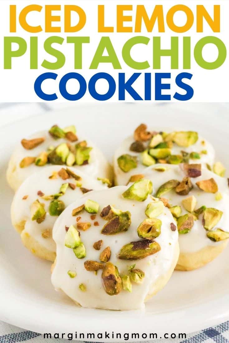 Five lemon pistachio cookies arranged on a white plate