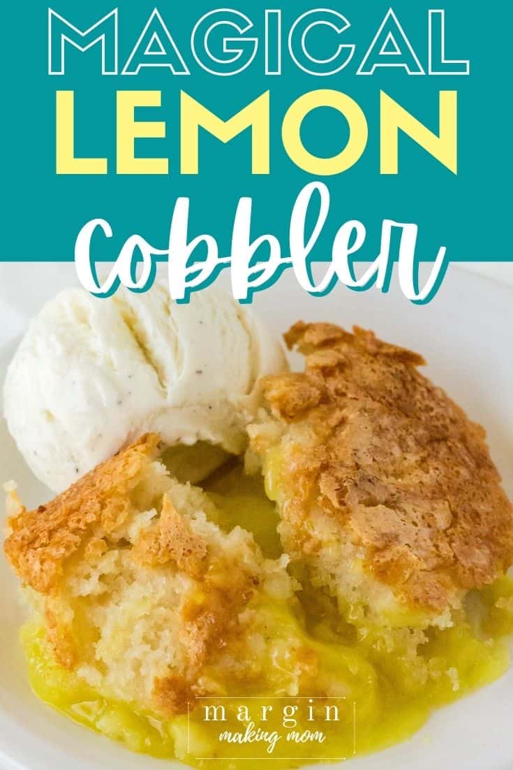 homemade lemon cobbler on a white plate with a scoop of vanilla ice cream.