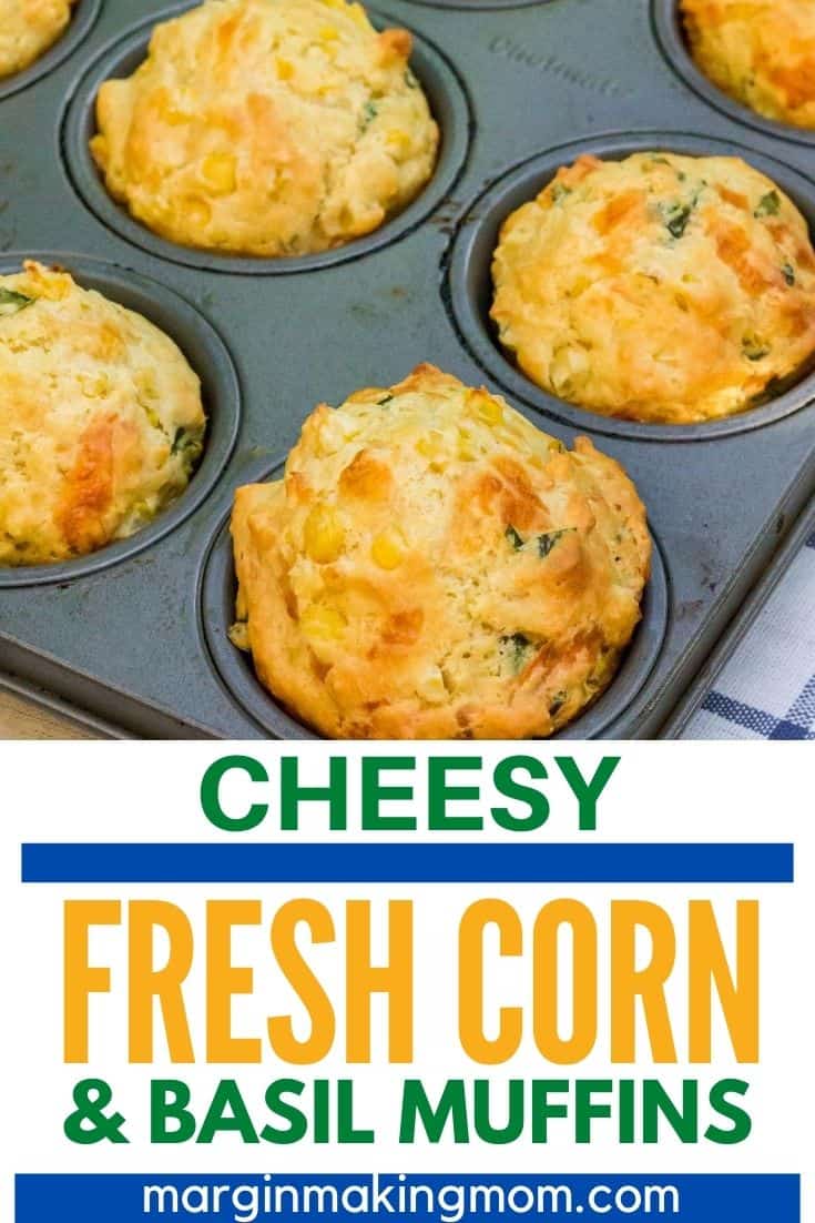 muffin pan with freshly baked muffins filled with fresh corn, basil, and cheese