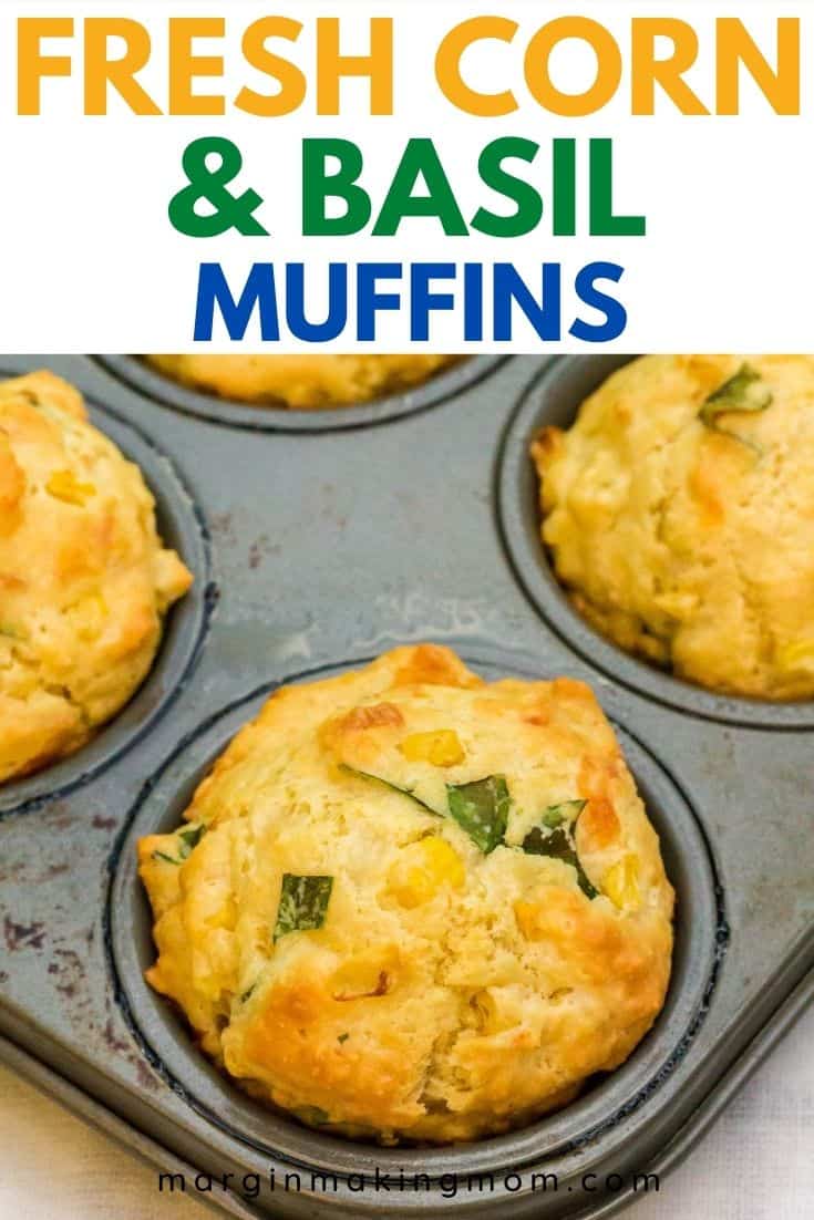 muffin tin with fresh corn and basil muffins that were freshly baked