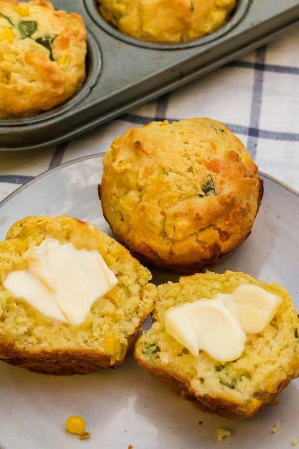 fresh corn and basil muffin spread with butter