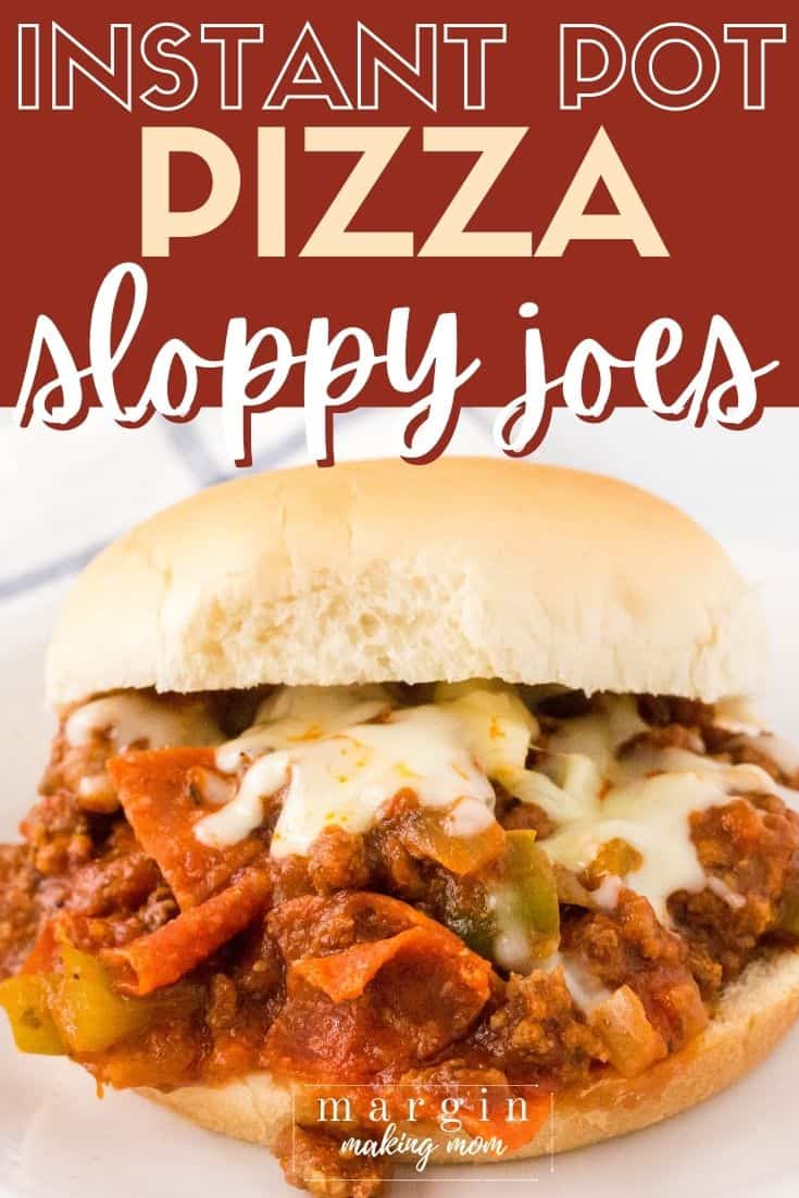 close-up view of an Instant Pot pizza sloppy joe sandwich, with pepperoni, ground beef, bell peppers, and mozzarella cheese.