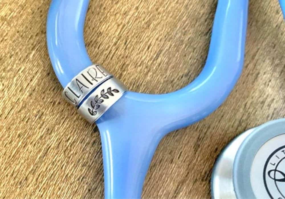 stethoscope ID tag that reads, "Claire" on a blue stethoscope, as an illustration for a good gift idea for nurses