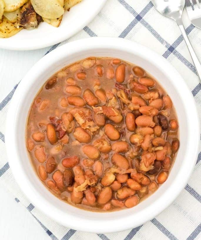 white bowl filled with Instant Pot pinto beans