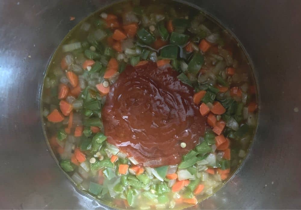 sauce added to other ingredients for cooking lentil sloppy joes in the Instant Pot.