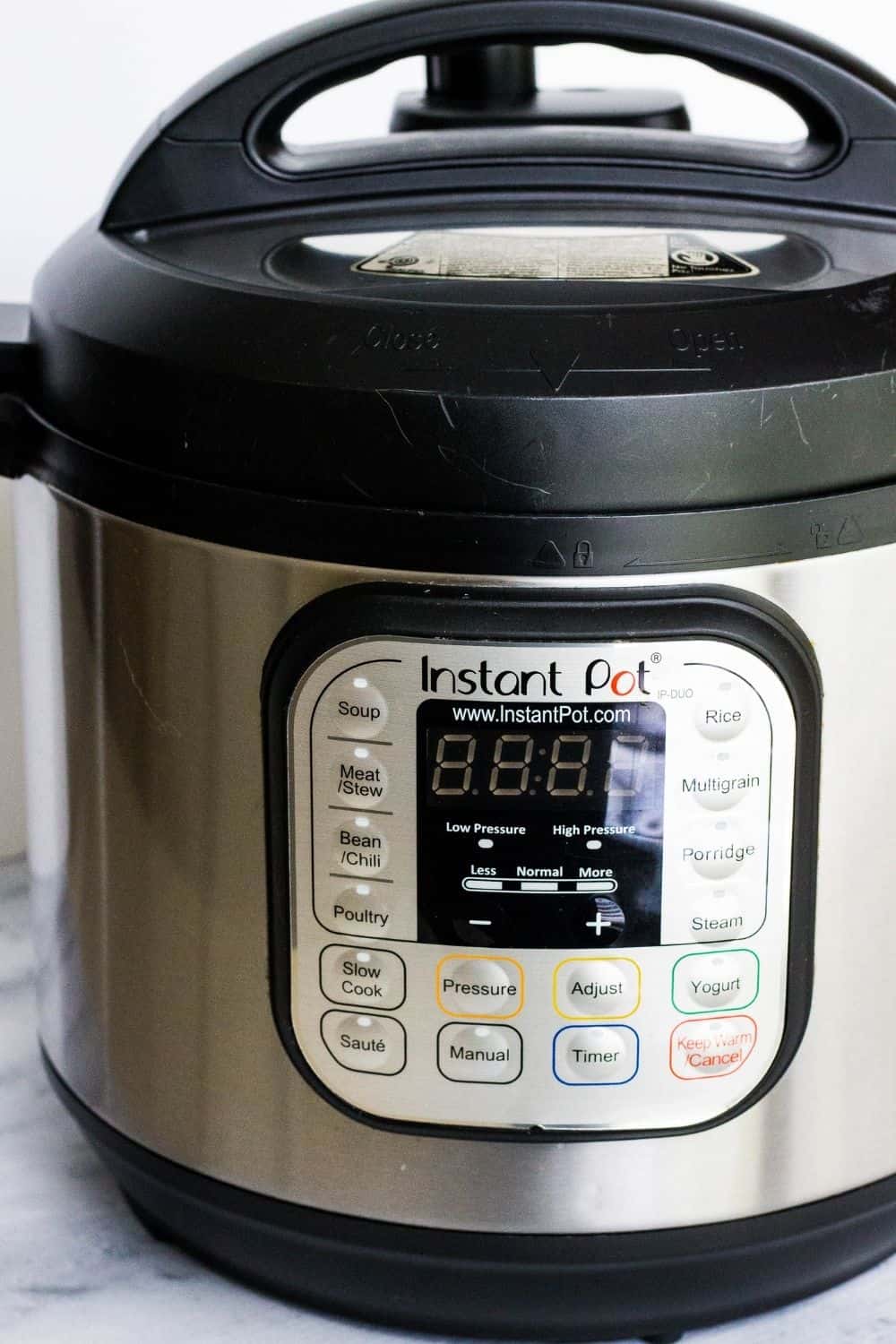 an Instant Pot DUO 60 on a marble kitchen surface