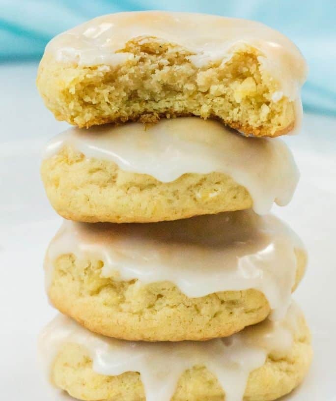 a stack of pineapple cookies topped with icing
