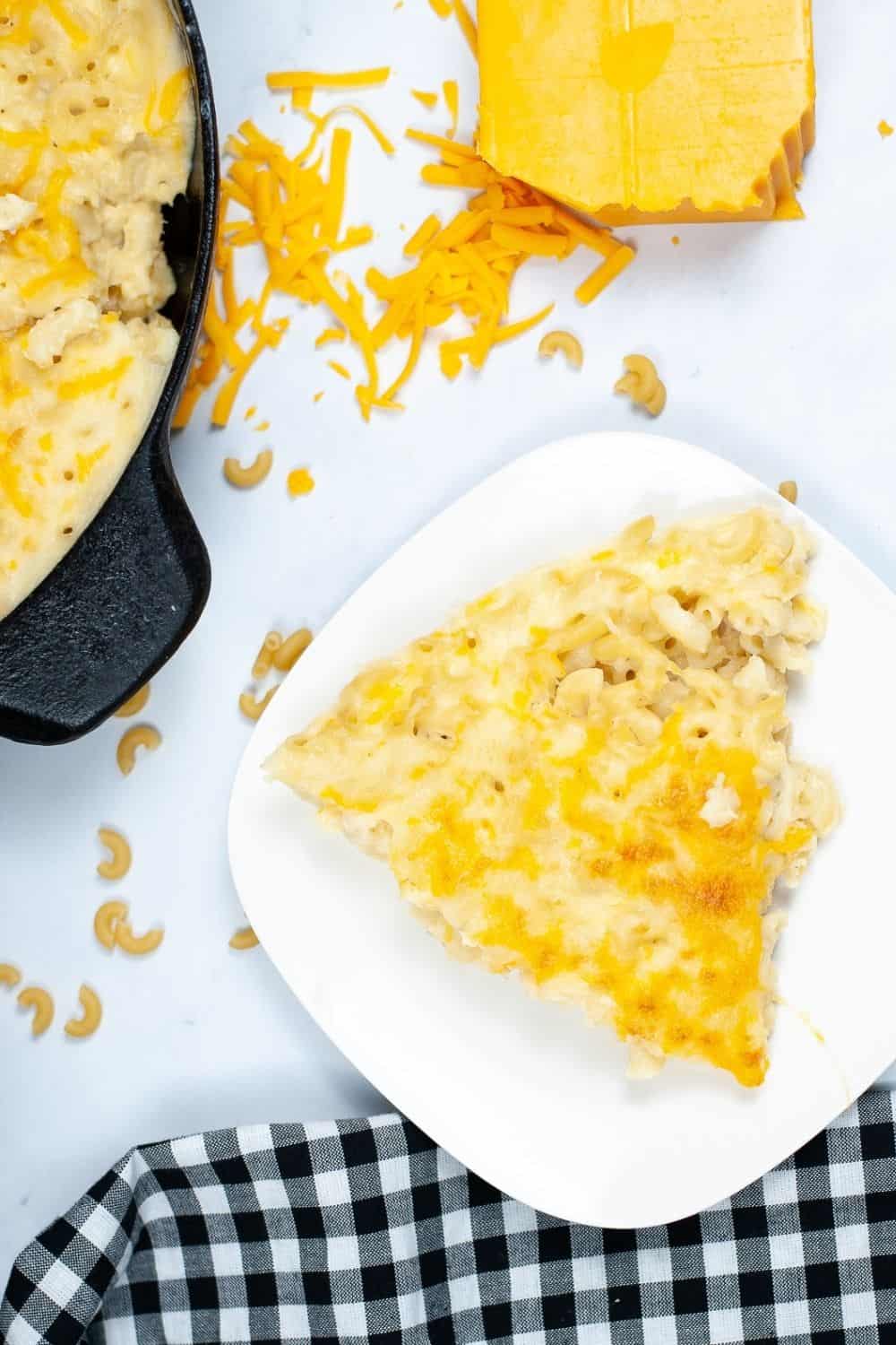 baked macaroni and cheese, a cracker barrel copycat recipe, served on a white square plate