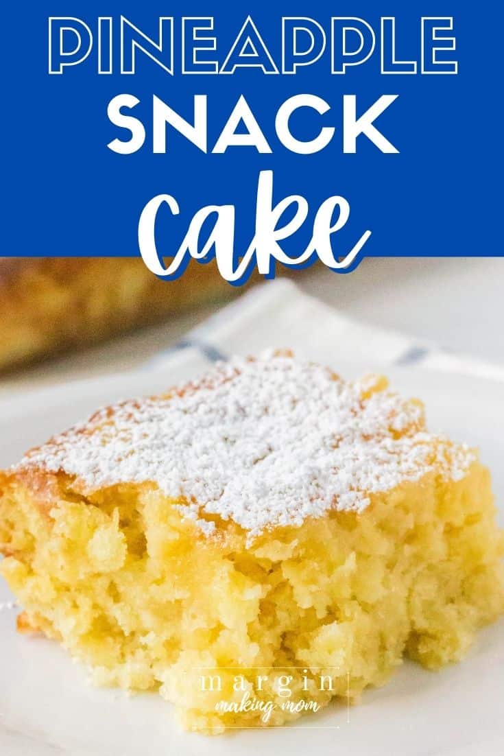 close-up view of a slice of pineapple snack cake on a white plate