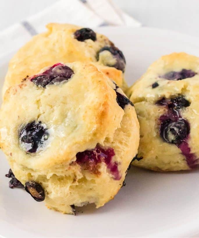 blueberry biscuits on a white plate