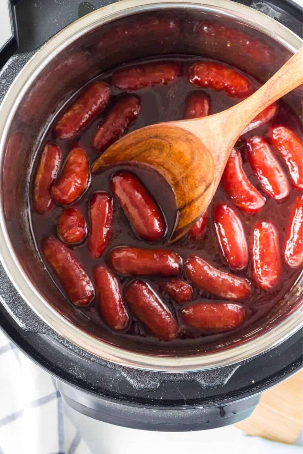 Freshly cooked Instant Pot cocktail weenies in sauce, ready to be served